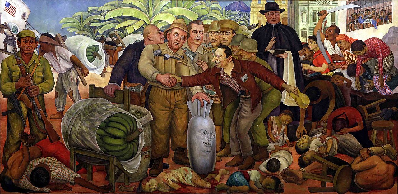 «Славна перемога», фреска Дієго Рівери (1954), що сатирично зображує роль держсекретаря США Джона Фостера Даллеса, ЦРУ та United Fruit Company в гватемальському перевороті.