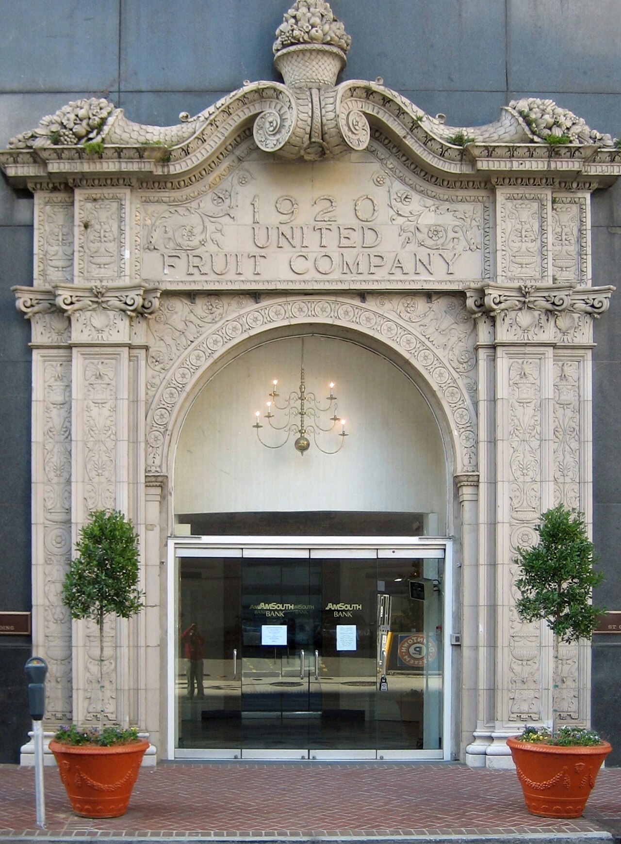The ornate entrance to the former United Fruit Company building at 321 St. Charles Avenue, New Orleans, a symbol of the immense wealth extracted from Central America.